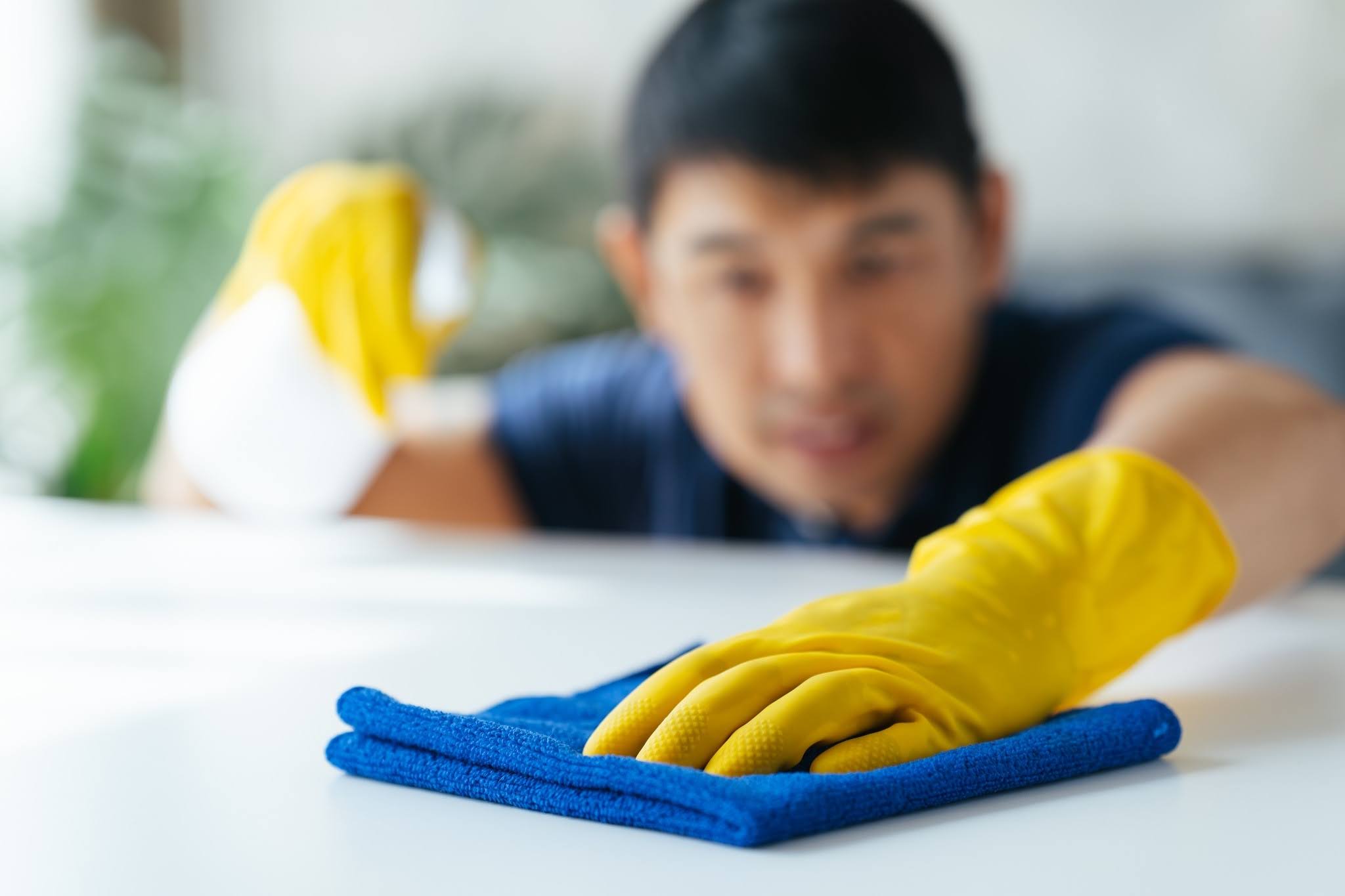 Cleaner dusting fixtures and cleaning floors after home renovation